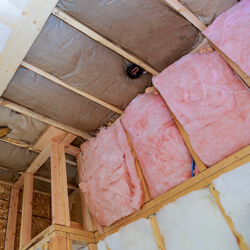 Covering View Of Layers Of Pink Fiberglass Insulation Cold Barrier